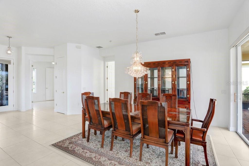 699 Glendora Road Kissimmee, FL 34759 - Photo 35 of 56 a dining room with furniture and window