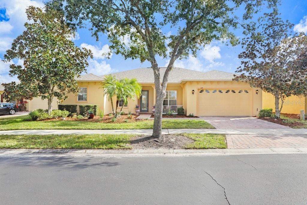 699 Glendora Road Kissimmee, FL 34759 - Photo 39 of 56 a house with trees in front of it