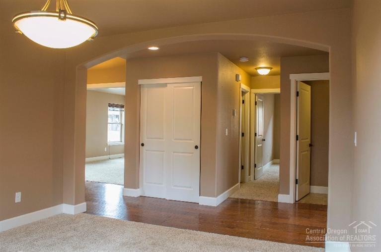 61723 Rigel Way Bend, OR 97702 - Photo 12 of 17 a view of a room with wooden floor and bathroom