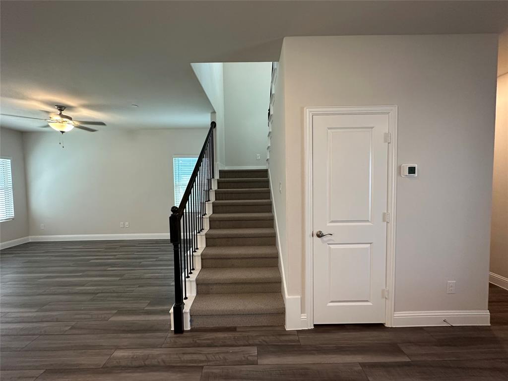 123 Monarch Way Wylie, TX 75098 - Photo 17 of 36 a view of entryway and hall with wooden floor