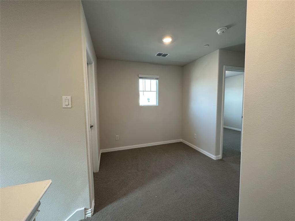 123 Monarch Way Wylie, TX 75098 - Photo 19 of 36 an empty room with windows