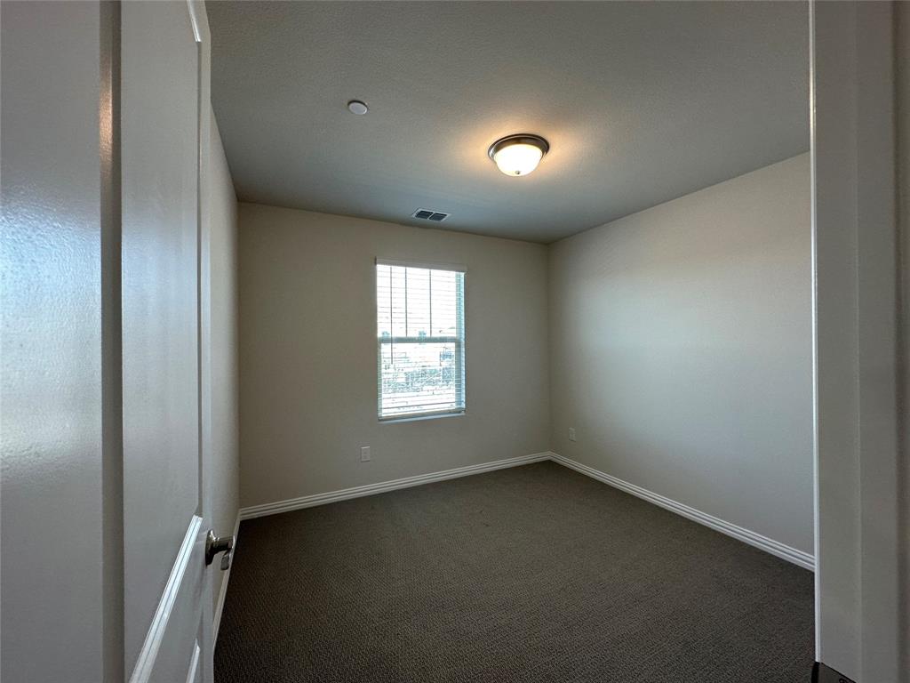 123 Monarch Way Wylie, TX 75098 - Photo 22 of 36 an empty room with a window
