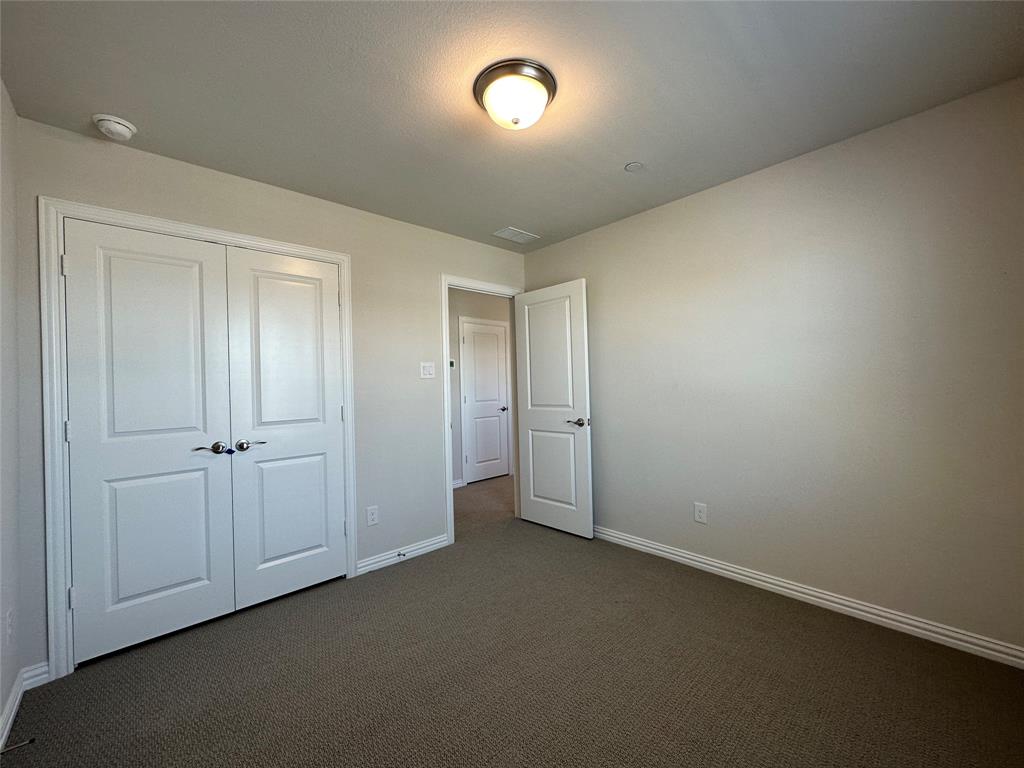 123 Monarch Way Wylie, TX 75098 - Photo 23 of 36 a view of an empty room and a window