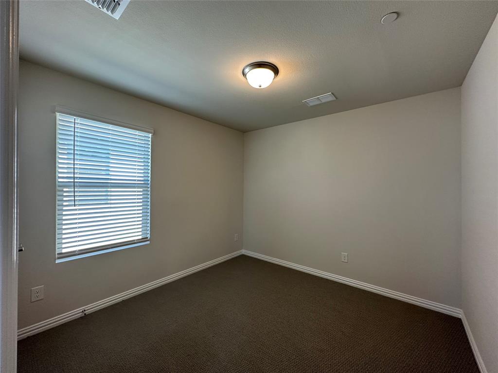 123 Monarch Way Wylie, TX 75098 - Photo 25 of 36 an empty room with a window