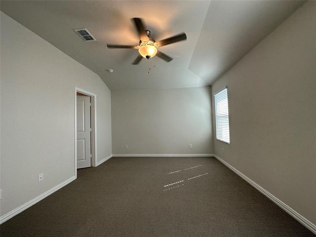 123 Monarch Way Wylie, TX 75098 - Photo 28 of 36 a view of an empty room with a window