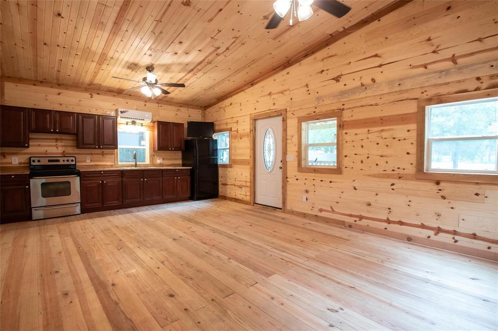 111 Ridgewood Lane Murchison, TX 75778 - Photo 16 of 36 another view of living room and kitchen area