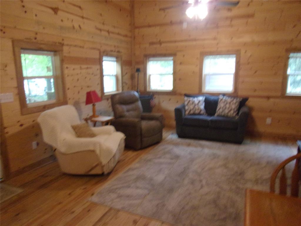 111 Ridgewood Lane Murchison, TX 75778 - Photo 17 of 38 a living room with furniture and a window