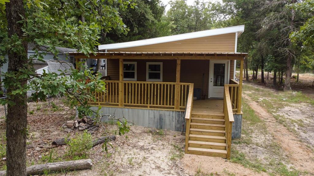 111 Ridgewood Lane Murchison, TX 75778 - Photo 9 of 36 Large porch facing the lake