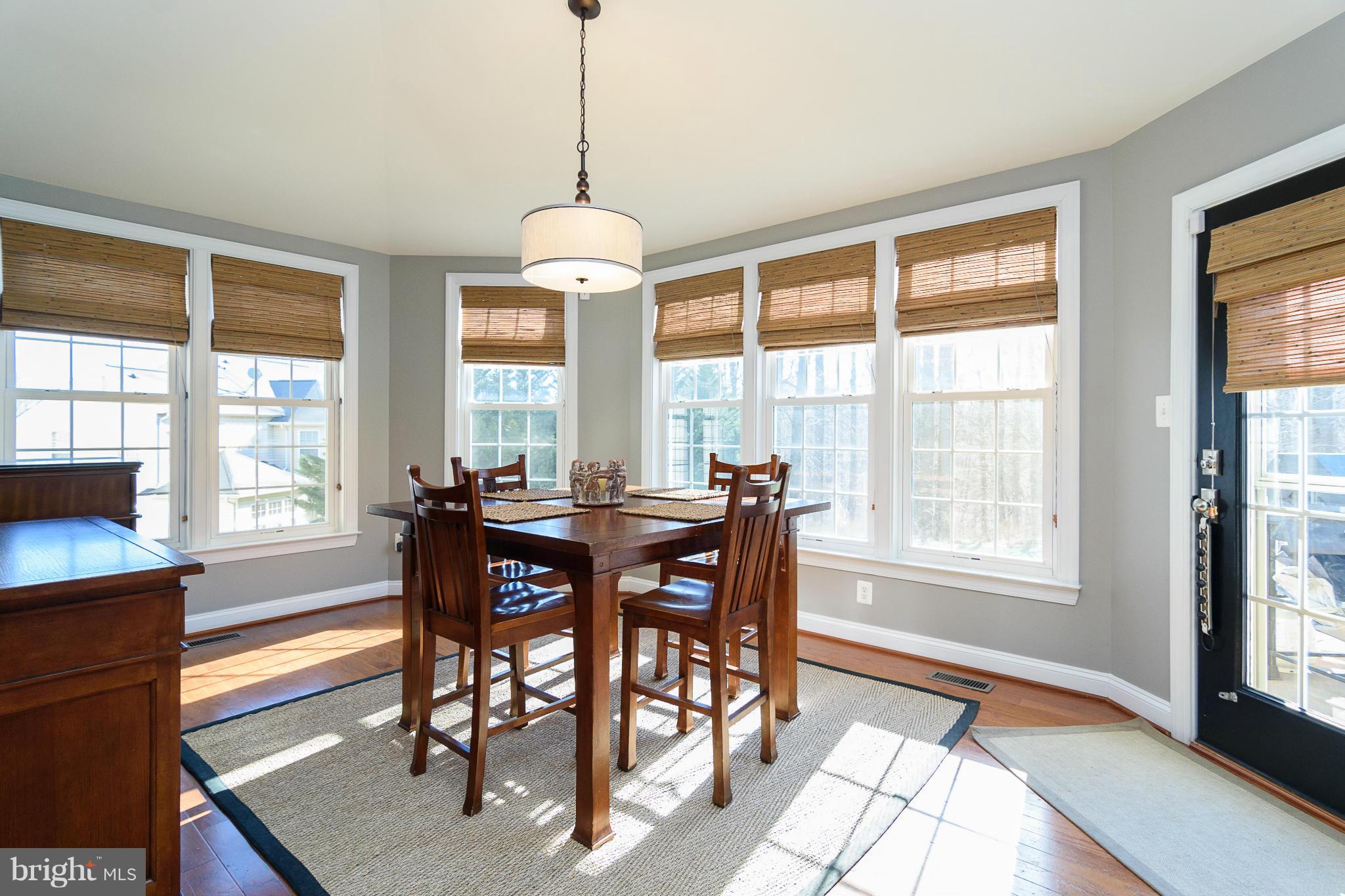 Bright sunroom off the kitchen