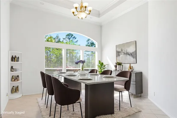 a kitchen with granite countertop white cabinets and sink