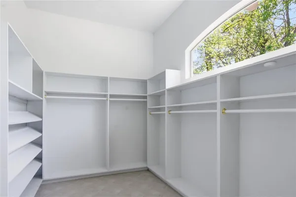 a bathroom with 2 sink and a mirror