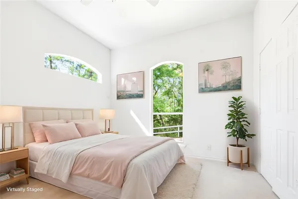 a view of a house with backyard and porch