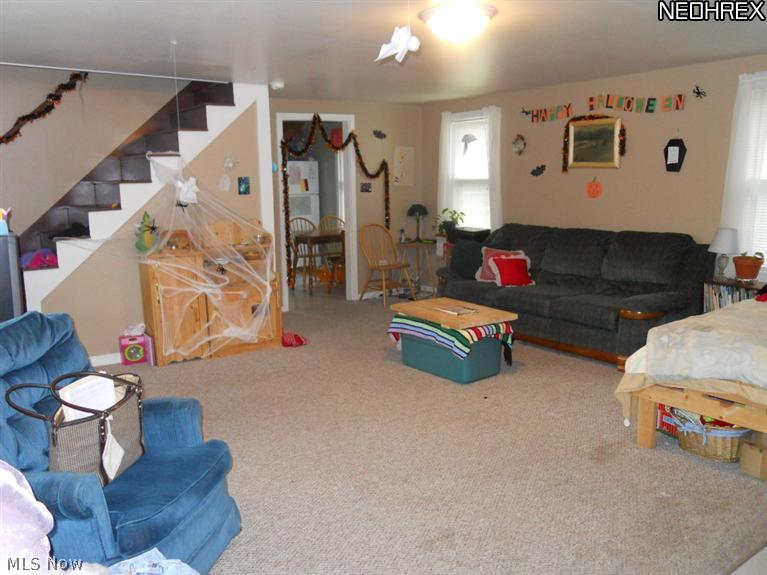17540 Kinsman Road Middlefield, OH 44062 - Photo 15 of 16 Rental 21x17 living room with stairs to 2nd floor 17x8 bedroom with 10x8 office area or playroom