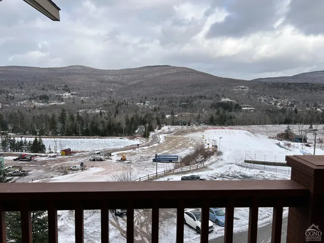 a view of swimming pool with mountain view