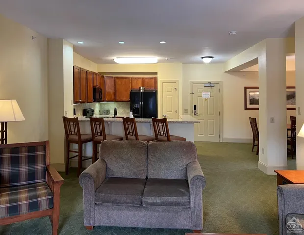 a living room with furniture and a couch