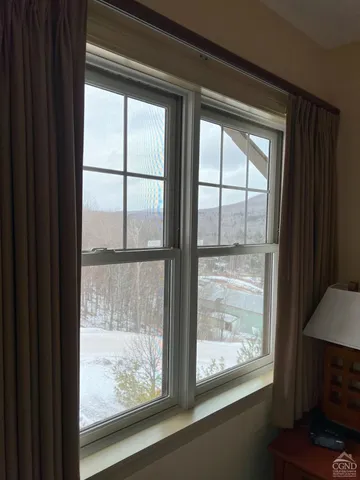 a view of window and a living room