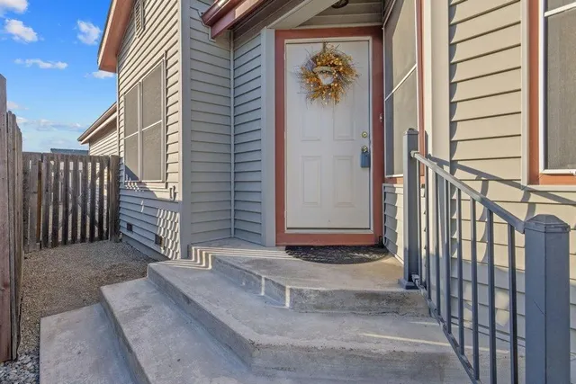 a view of a house with a yard and garage
