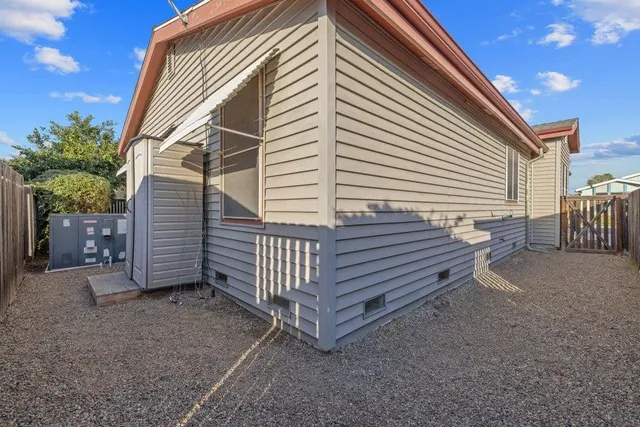 a view of a back yard of the house