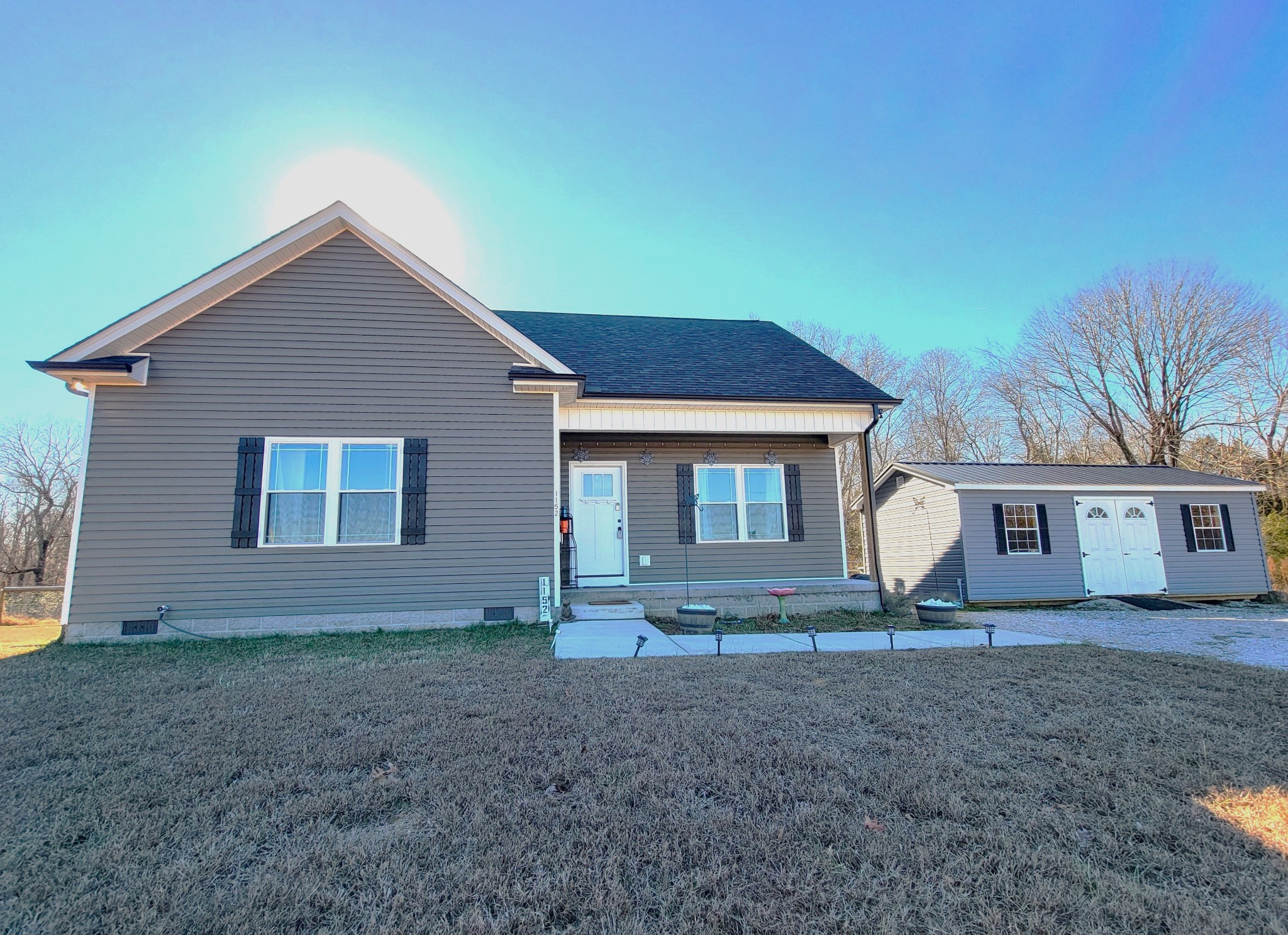 1152 Oak Grove Road Dickson, TN 37055 - Photo 2 of 53 a front view of a house with a yard