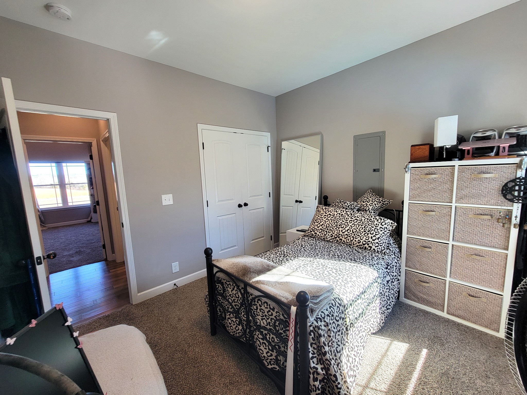 1152 Oak Grove Road Dickson, TN 37055 - Photo 28 of 53 a living room with a bed and a dresser