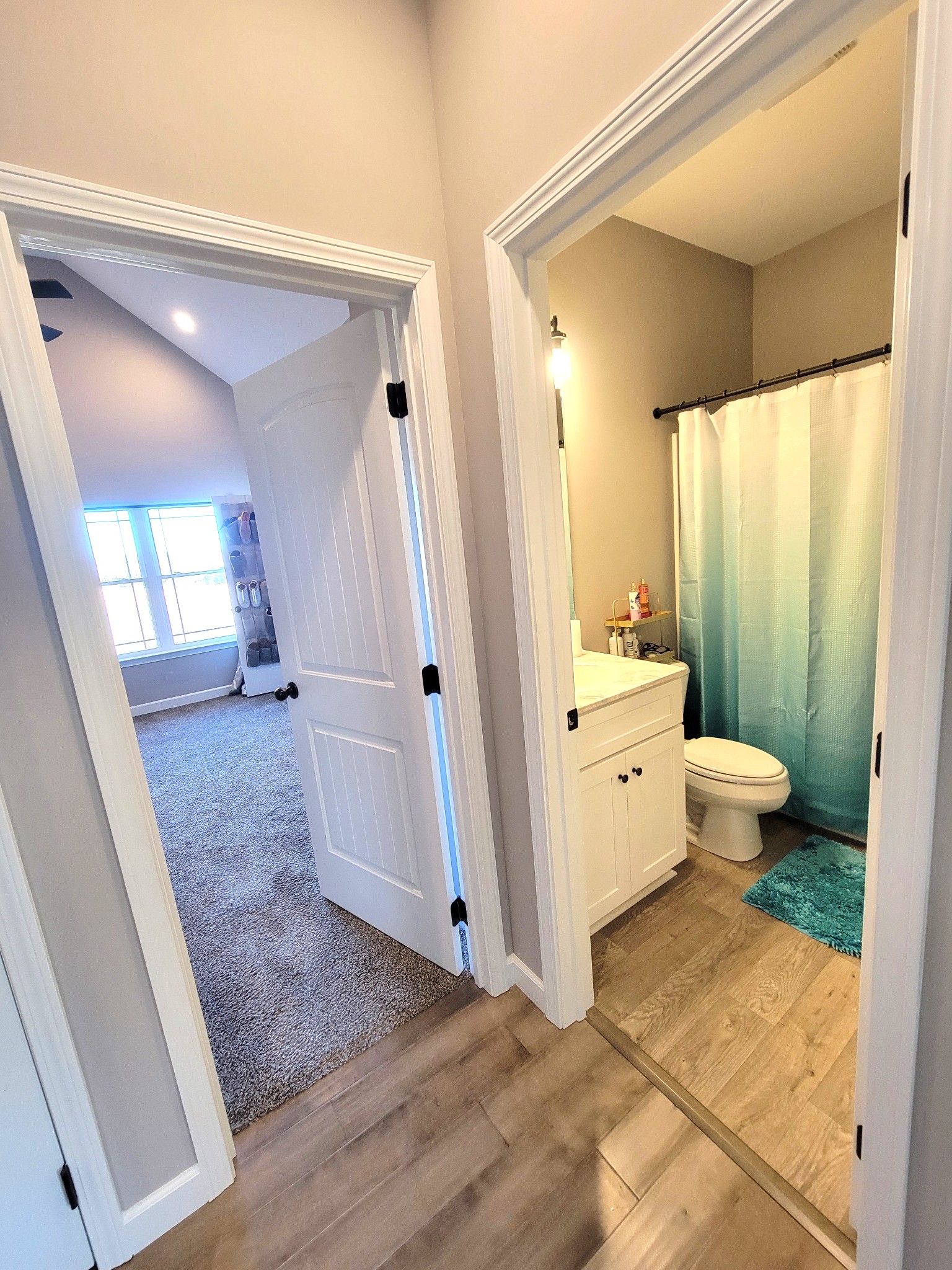 1152 Oak Grove Road Dickson, TN 37055 - Photo 29 of 53 a bathroom with a sink a toilet a mirror and shower
