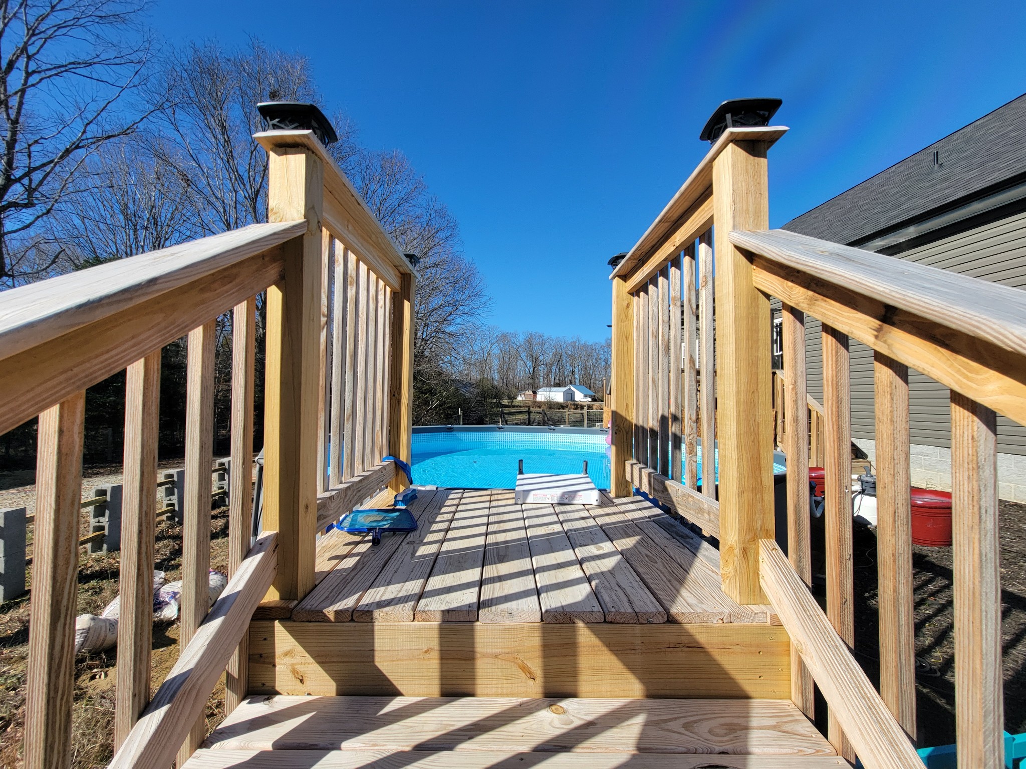 1152 Oak Grove Road Dickson, TN 37055 - Photo 36 of 53 a view of a balcony with wooden floor and stairs