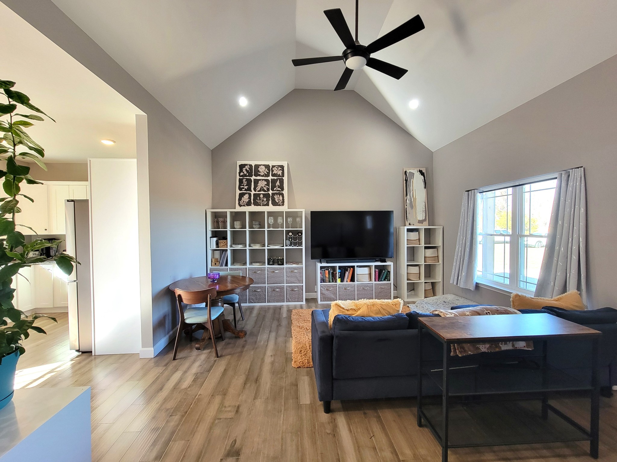1152 Oak Grove Road Dickson, TN 37055 - Photo 6 of 53 a living room with furniture and a flat screen tv