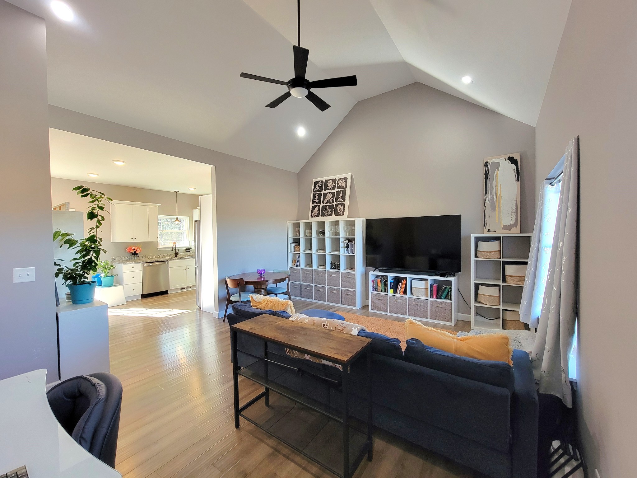1152 Oak Grove Road Dickson, TN 37055 - Photo 10 of 53 a living room with furniture and a flat screen tv