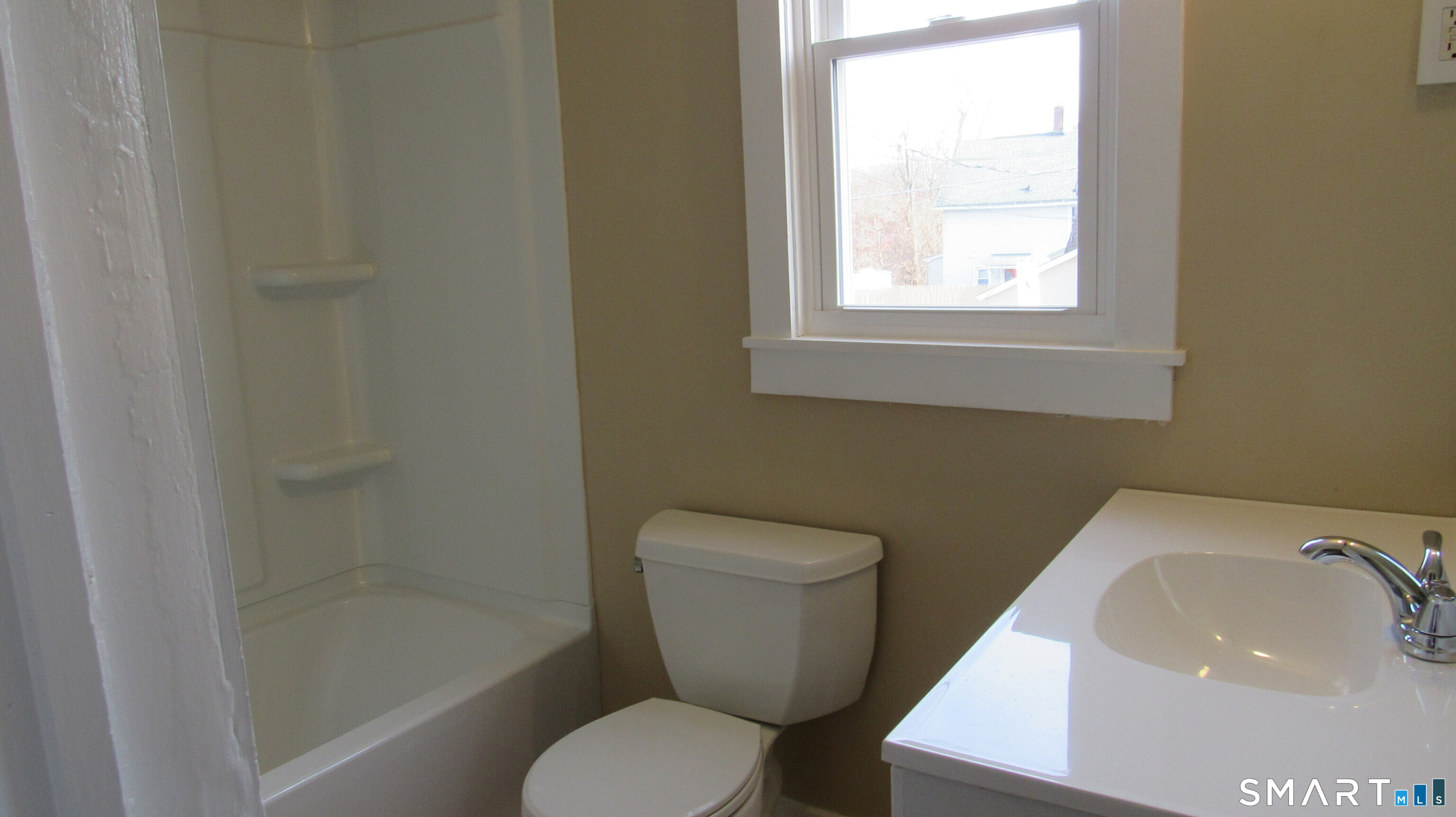 246 North Elm Street Torrington, CT 06790 - Photo 6 of 11 a bathroom with a sink toilet and shower