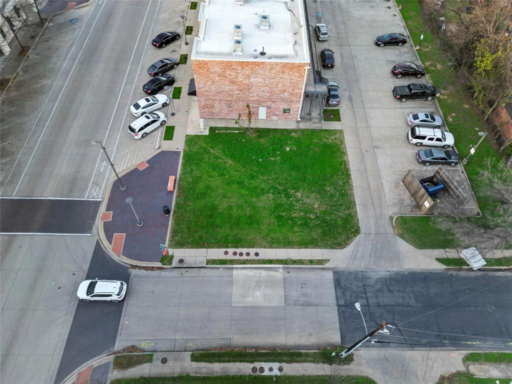 5216 Bexar Street Dallas, TX 75215 - Photo 4 of 6 an aerial view of a house with a yard