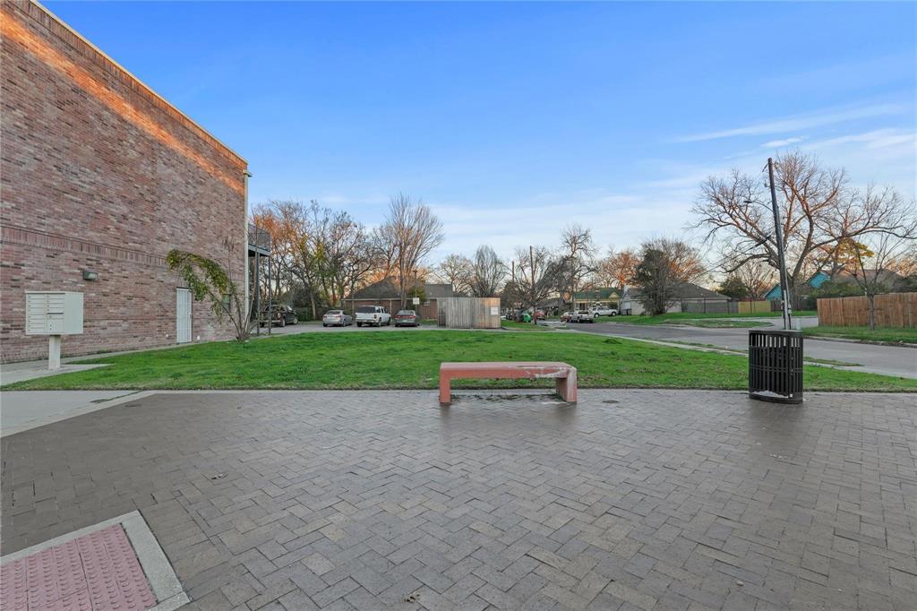 5216 Bexar Street Dallas, TX 75215 - Photo 5 of 6 a view of outdoor space with playground and green space
