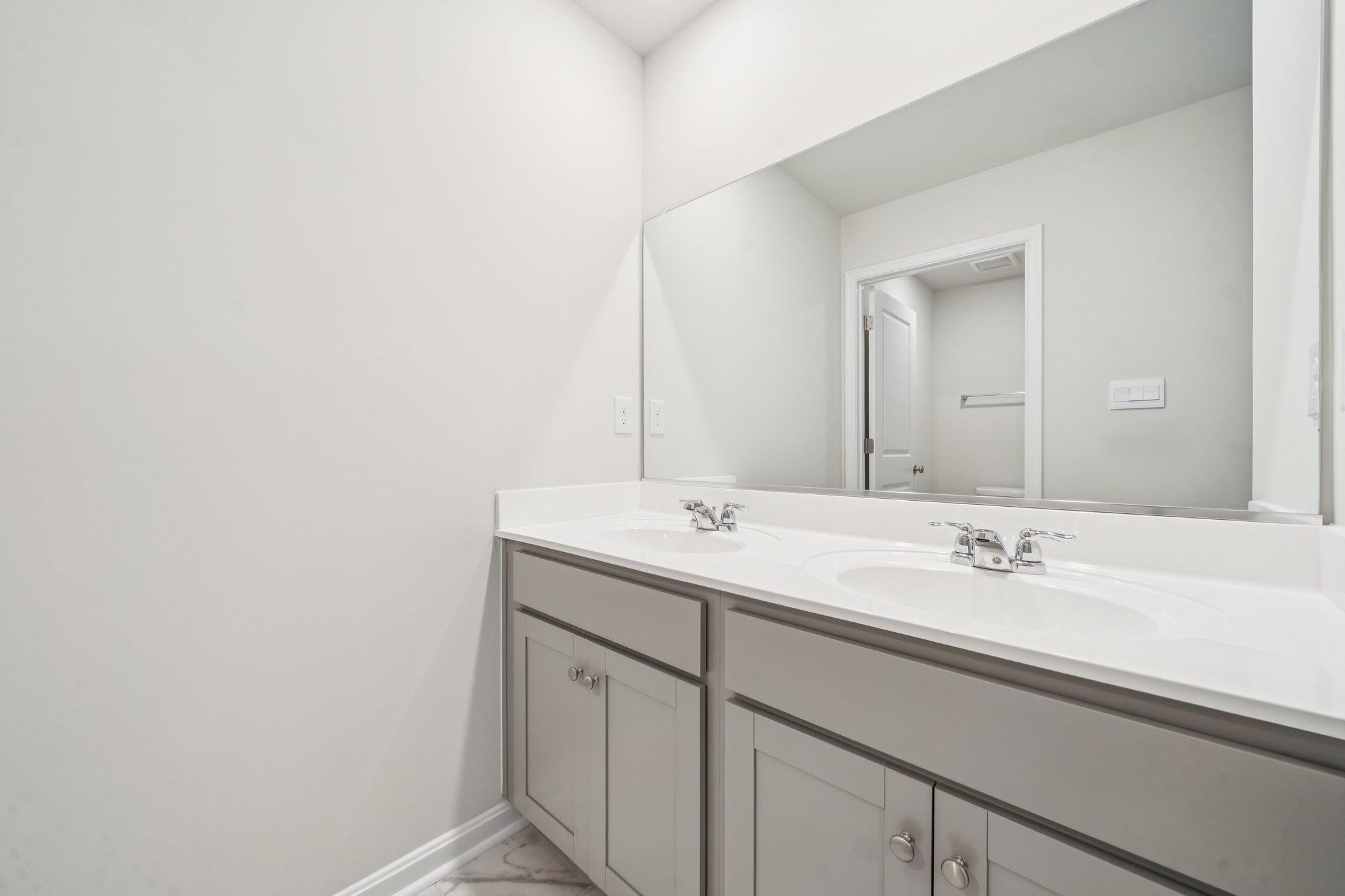 101 Stonewall Jackson Road Waynesboro, VA 22980 - Photo 22 of 30 a bathroom with a sink and a mirror