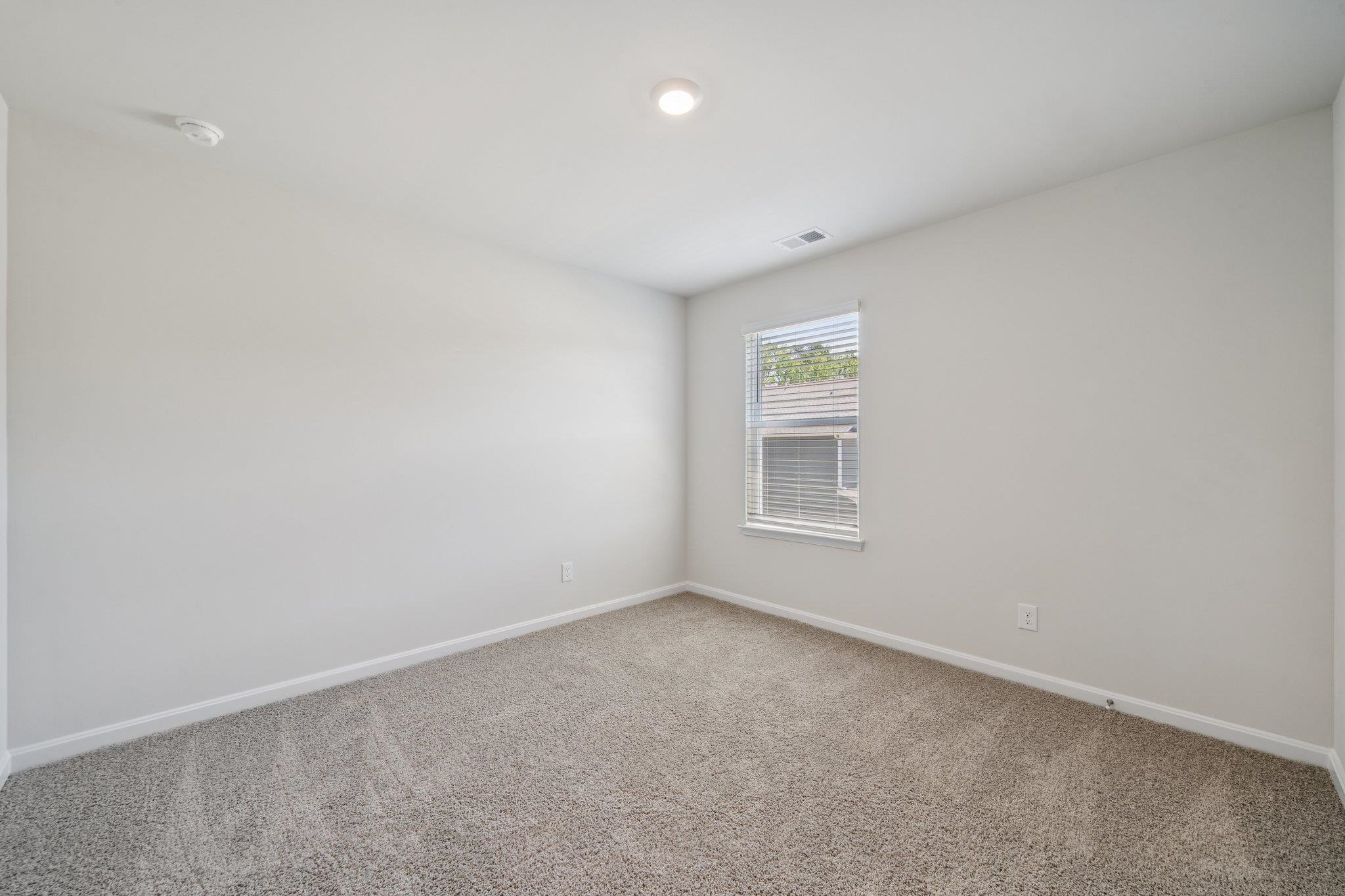 101 Stonewall Jackson Road Waynesboro, VA 22980 - Photo 24 of 30 an empty room with a window
