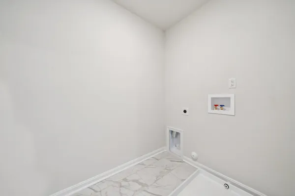 a bathroom with a sink a toilet and a bathtub