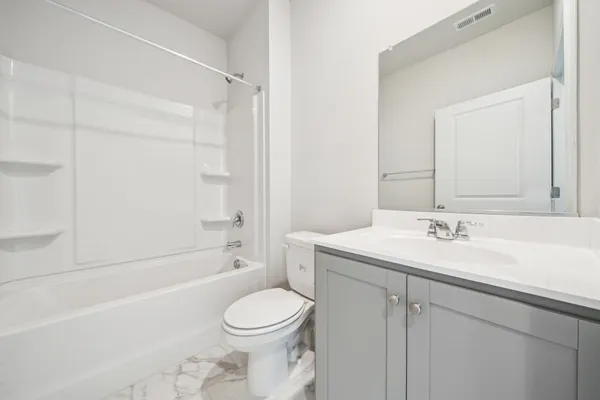 an empty room with a empty space and window