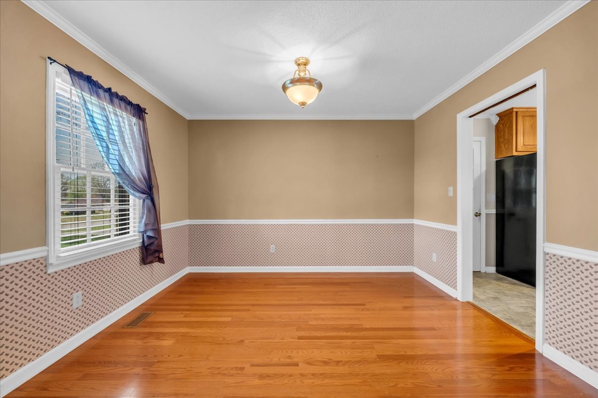 1587 Bypass Road Winchester, TN 37398 - Photo 12 of 26 a view of an empty room with a window