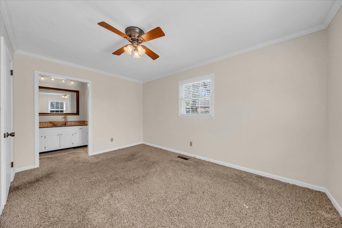1587 Bypass Road Winchester, TN 37398 - Photo 21 of 26 a view of an empty room with a window