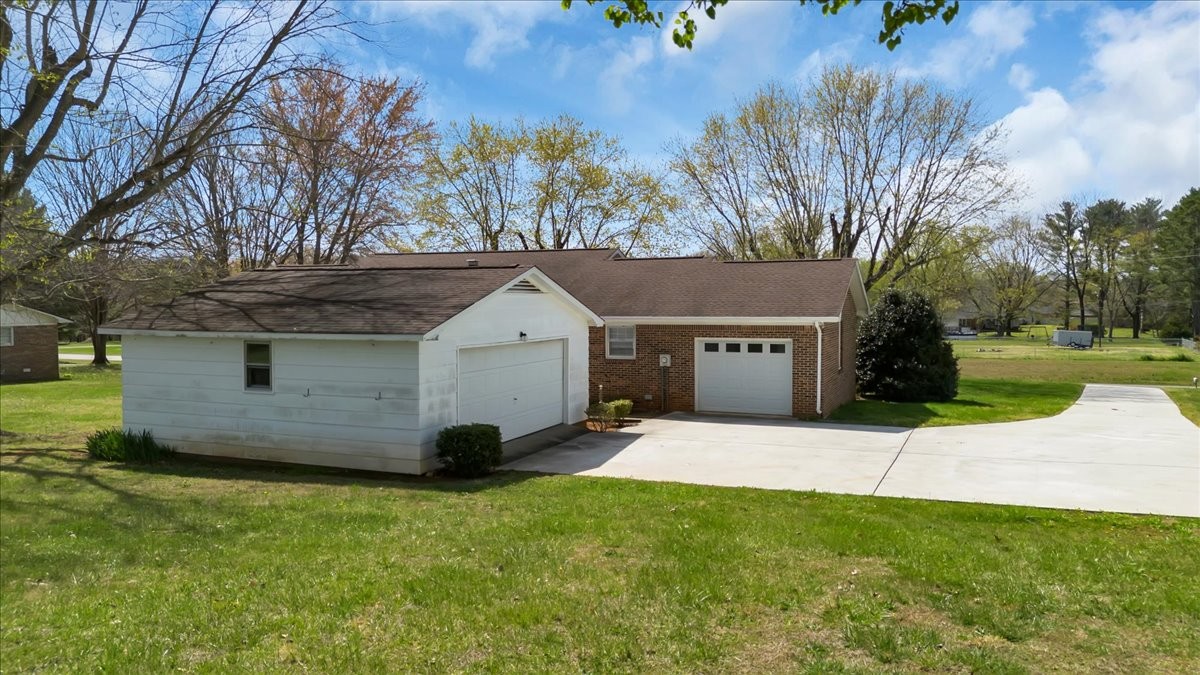 1587 Bypass Road Winchester, TN 37398 - Photo 9 of 26 a view of backyard with a garden and entertaining space