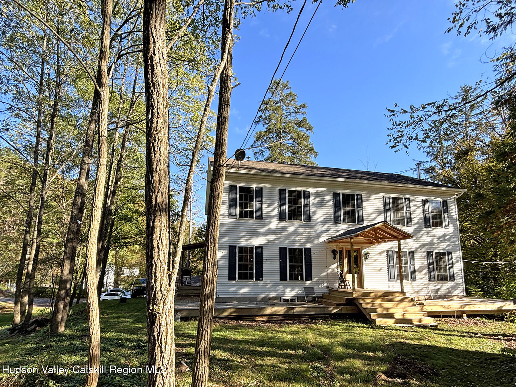 front view of a house with a small yard