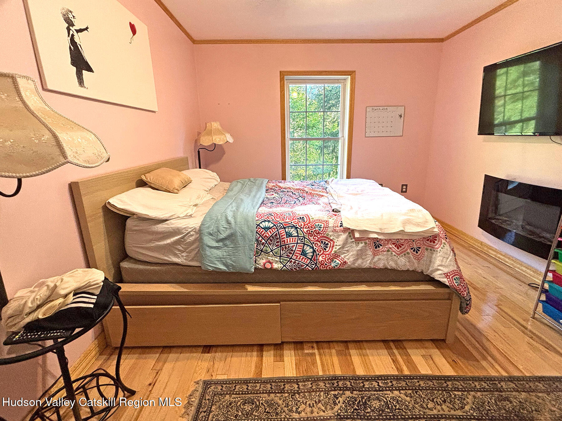14 Park Road Chichester, NY 12416 - Photo 21 of 37 a bedroom with a bed and a window