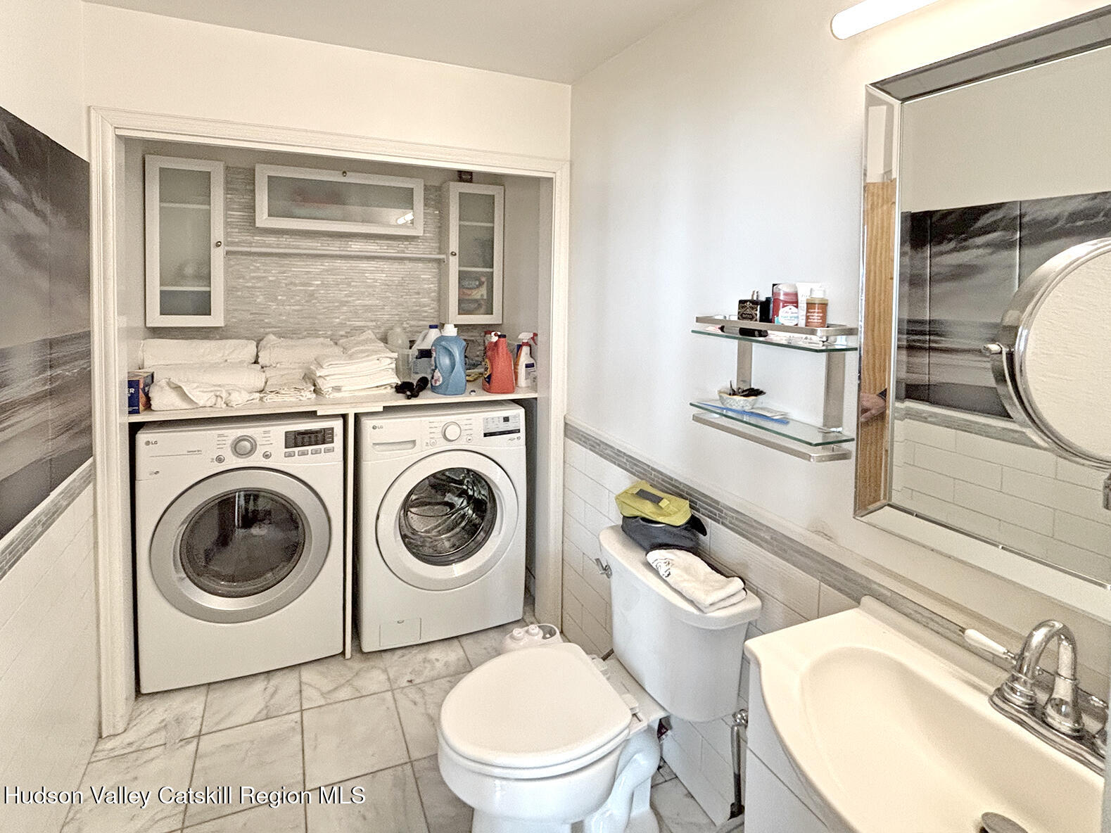 14 Park Road Chichester, NY 12416 - Photo 26 of 37 a bathroom with a toilet sink and mirror