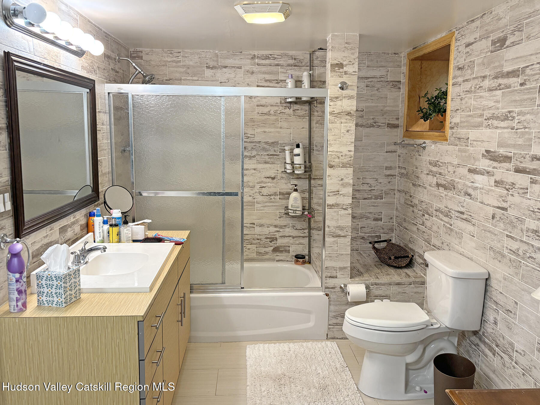 14 Park Road Chichester, NY 12416 - Photo 30 of 37 a bathroom with a sink toilet and shower