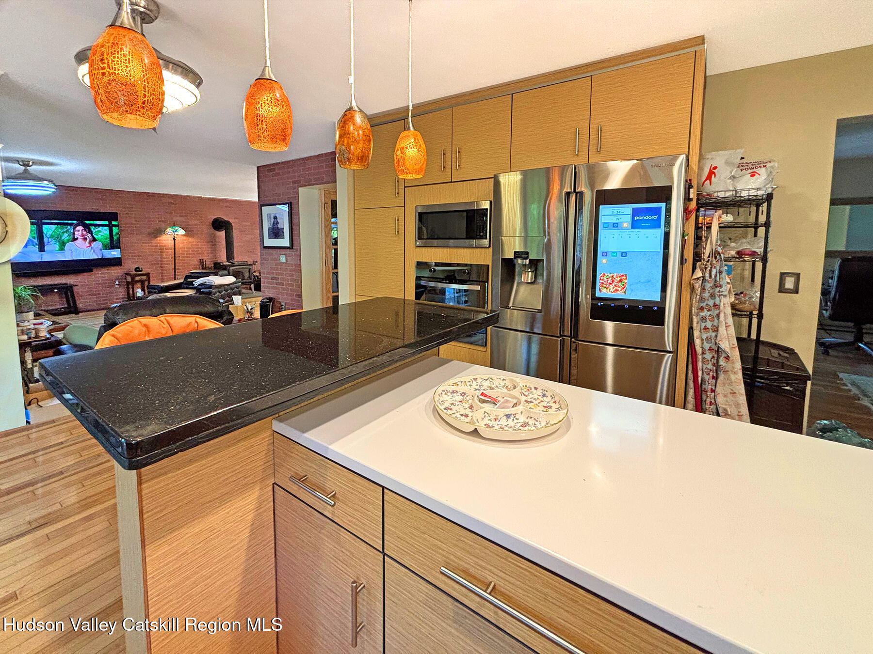 14 Park Road Chichester, NY 12416 - Photo 9 of 37 a kitchen with stainless steel appliances granite countertop a sink refrigerator and cabinets
