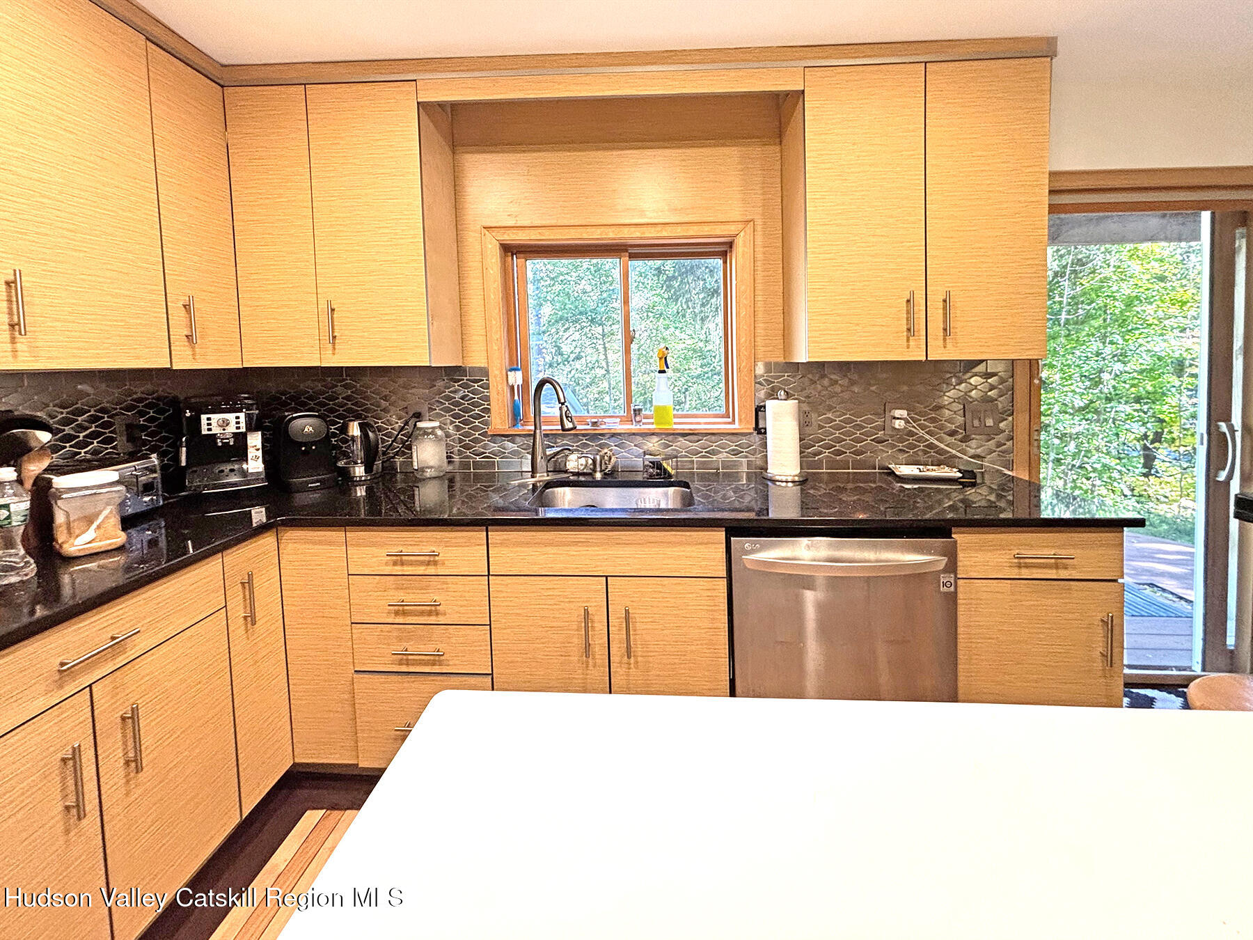 14 Park Road Chichester, NY 12416 - Photo 10 of 37 a kitchen with granite countertop sink and cabinets