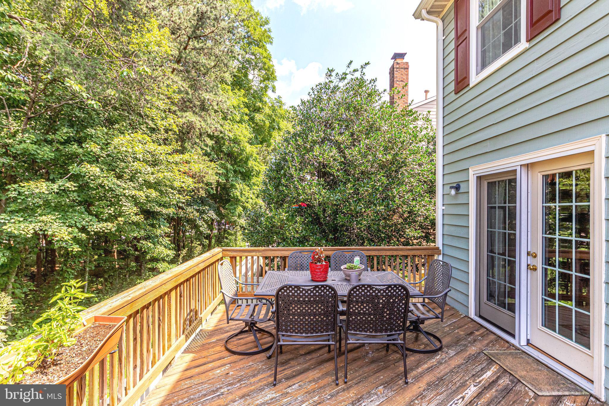 1486 Autumn Ridge Circle Reston, VA 20194 - Photo 26 of 28 Main level deck w/ view of trees!