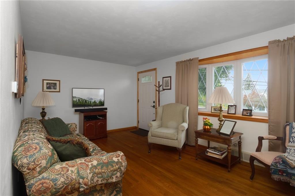 From the moment you open the brand new front door, you're greeted with hardwood floors and tons of natural light! 