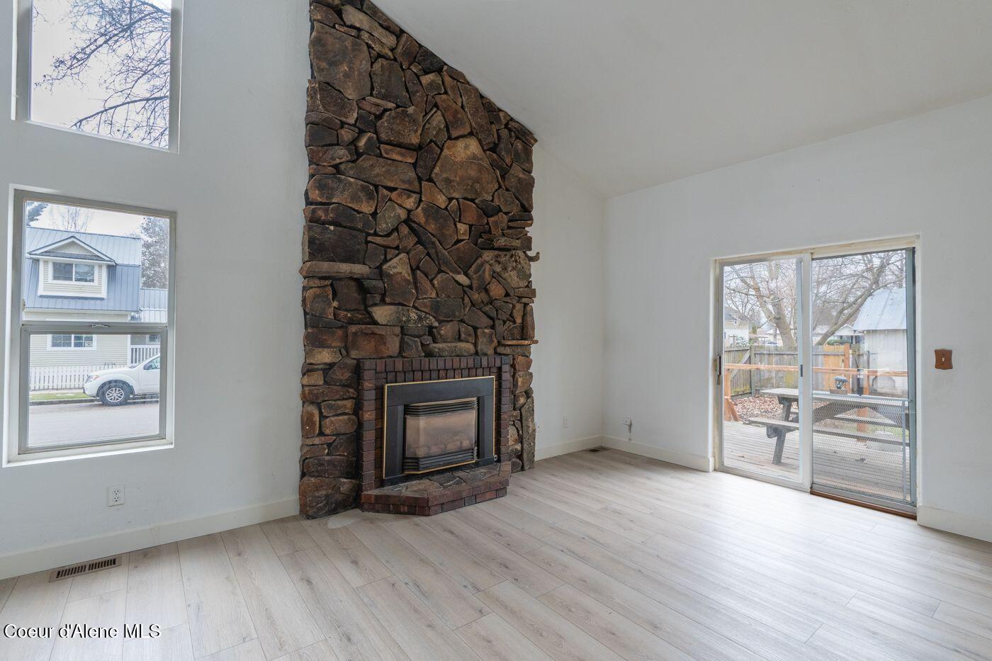1001 North 6th Street Coeur D'Alene, ID 83814 - Photo 3 of 27 Floor to ceiling rock fireplace