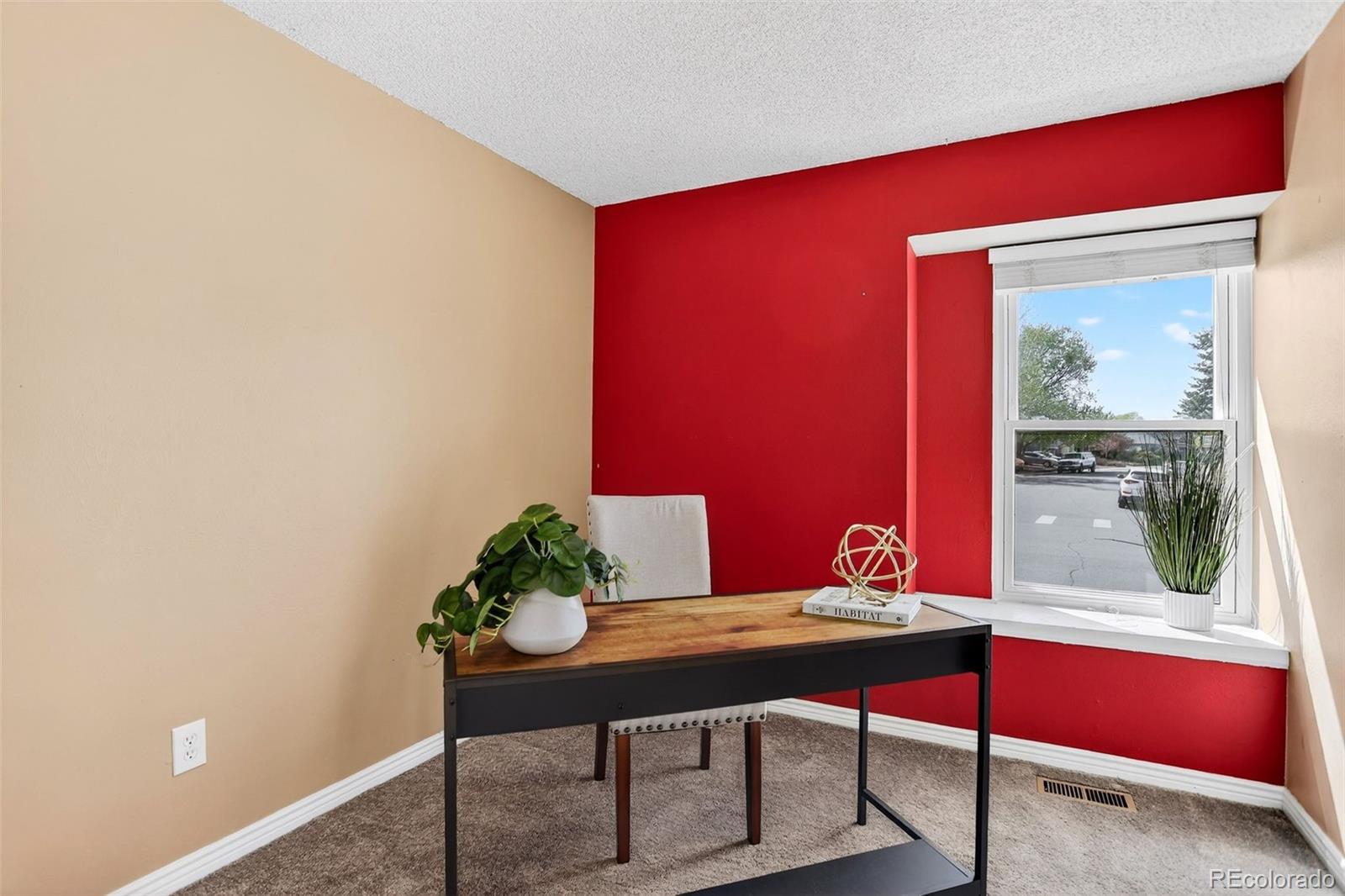 4550 Eugene Way Denver, CO 80239 - Photo 14 of 21 a view of a room with a table and chairs