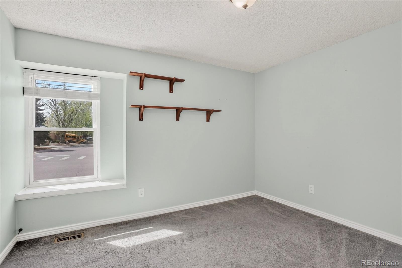 4550 Eugene Way Denver, CO 80239 - Photo 15 of 21 an empty room with a window