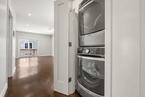 a view of a kitchen with washer and dryer
